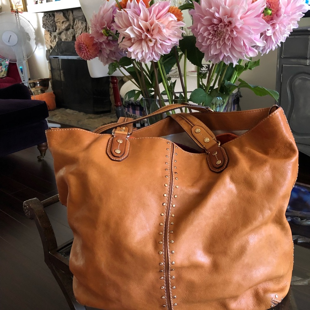 MK leather satchel I get more compliments on this